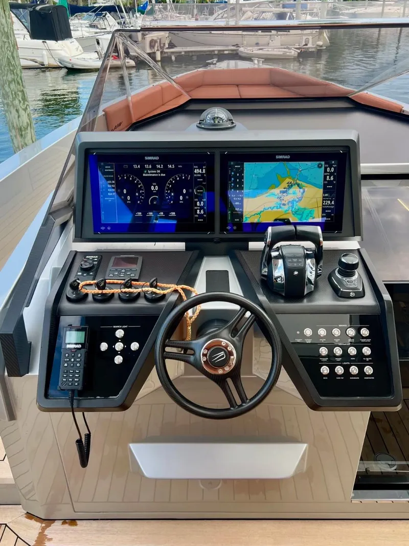 Slide: The Image of Helm of 2023 Wally 48 X yacht with advanced navigation displays and controls. - 41
