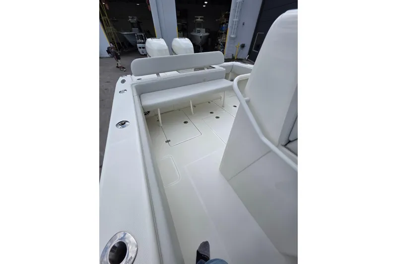 Slide: The Image of 2022 SeaVee 340Z boat interior with seating and storage compartments. - 13