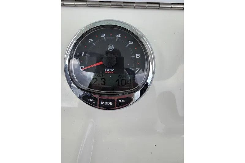 Slide: The Image of Close-up of a 2022 SeaVee 340Z boat tachometer displaying RPM, volts, and hours. - 14