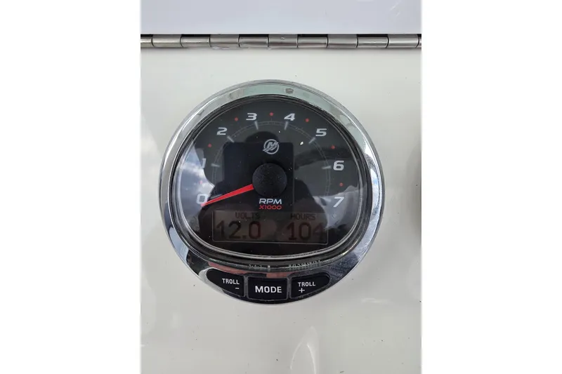 Slide: The Image of Close-up of a 2022 SeaVee 340Z RPM gauge displaying 104 hours. - 15