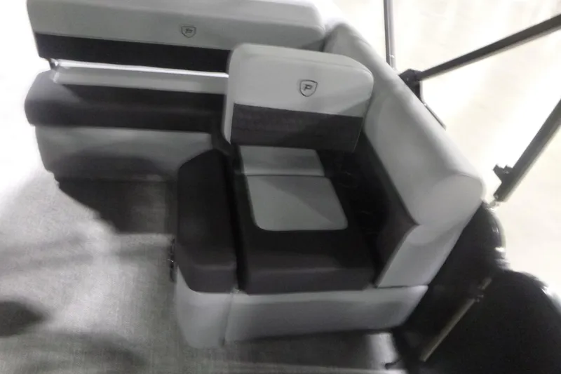 Slide: The Image of 2026 Premier 230 Sunsation RS boat seating, featuring modern gray and black upholstery. - 12