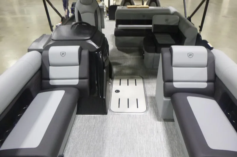 Slide: The Image of Interior of 2026 Premier 230 Sunsation RS pontoon boat with gray seating. - 5
