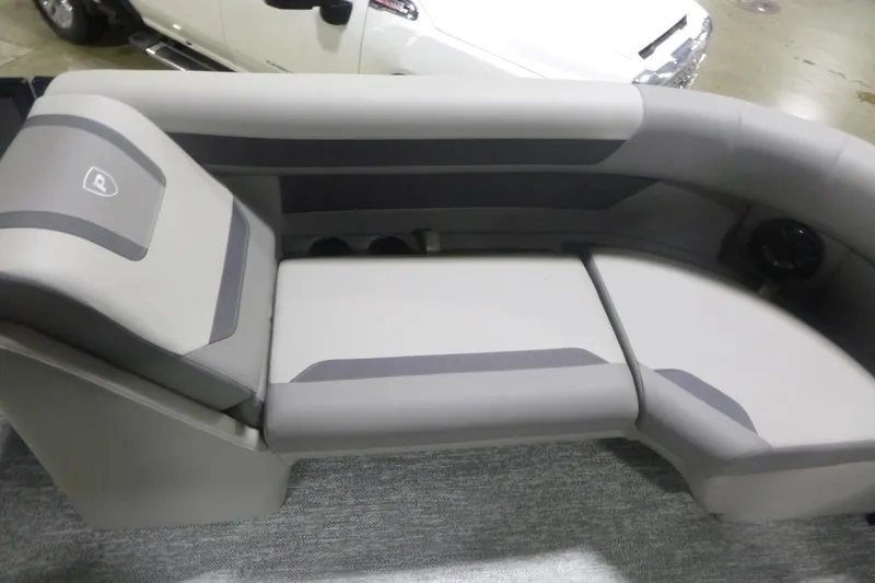 Slide: The Image of Premier 200 Sunscape RF 2026 boat interior with gray cushioned seating. - 10
