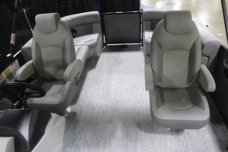 Slide: The Image of Interior of 2026 Premier 200 Sunscape RF boat with plush seating and modern design. - 12