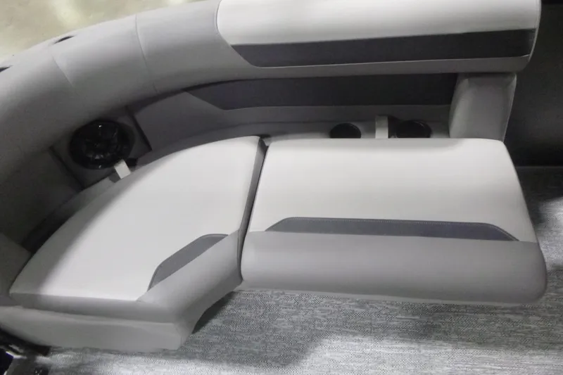 Slide: The Image of 2026 Premier 200 Sunscape RF boat interior seating, featuring sleek gray upholstery and modern design. - 17