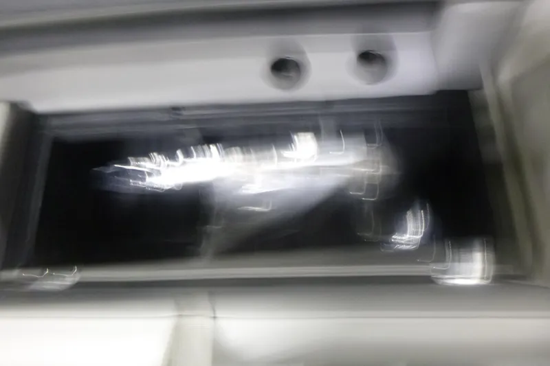 Slide: The Image of Blurry interior view of a 2026 Premier 200 Sunscape RF boat. - 9