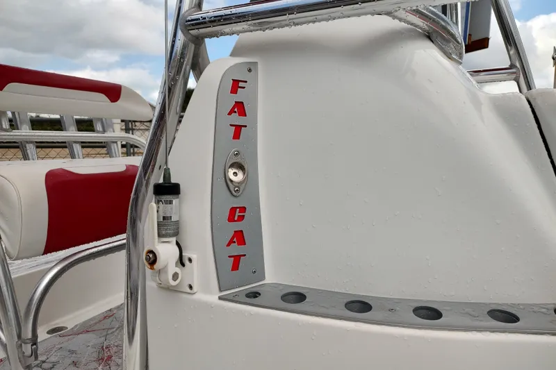 Slide: The Image of Fat Cat 21 boat interior with red and white seating, 2016 model. - 10