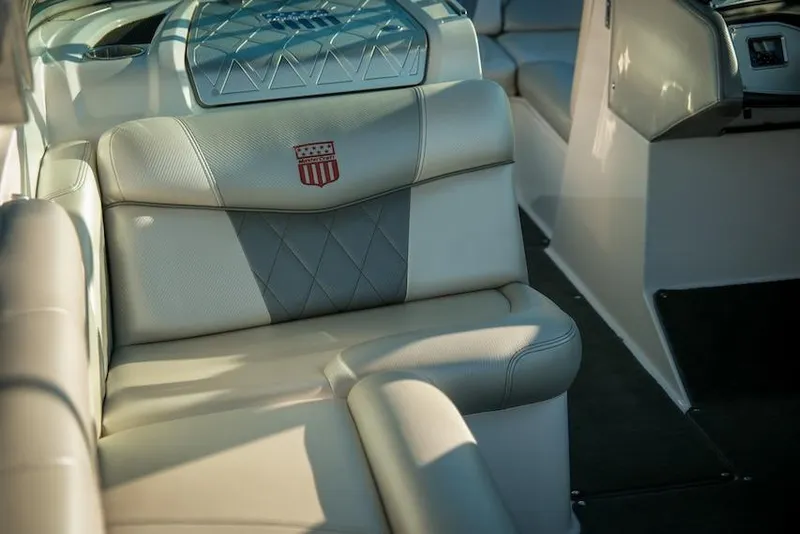 Slide: The Image of 2013 MasterCraft X-2 boat interior with luxurious seating and elegant design. - 12