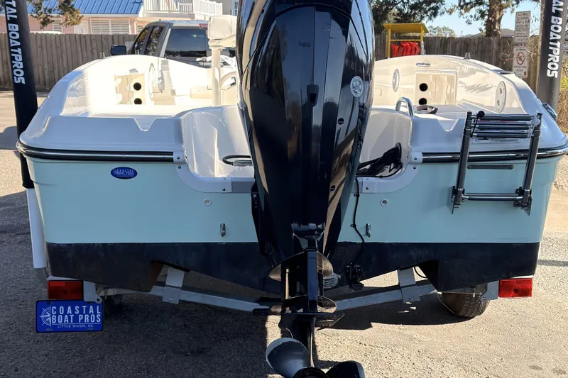Slide: The Image of 2023 Trophy T-18 boat with outboard motor on trailer, Coastal Boat Pros. - 4