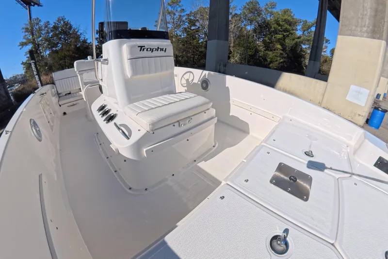 Slide: The Image of 2023 Trophy T-18 boat interior with white seating and control console. - 6