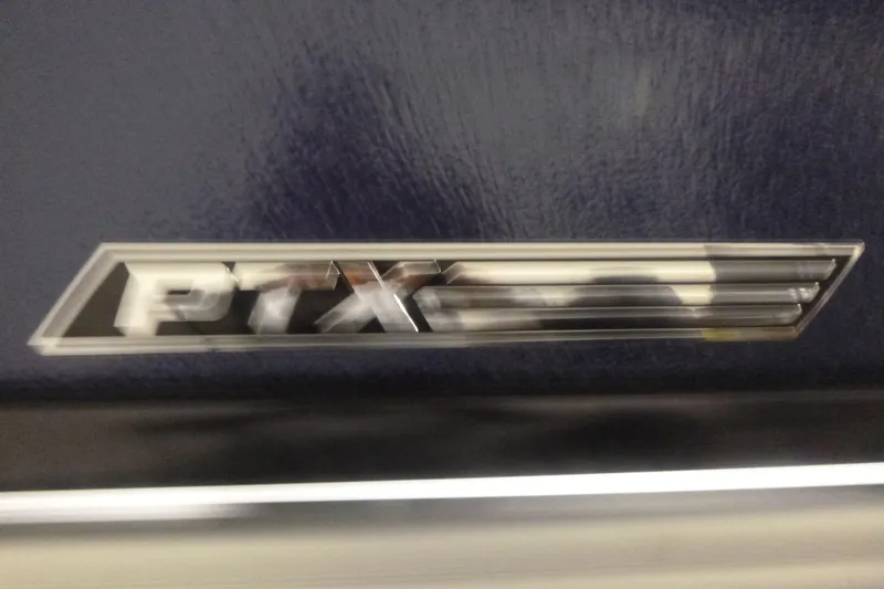 Slide: The Image of PTX emblem on 2026 Premier 210 SunSation Angler 4 Point boat. - 18