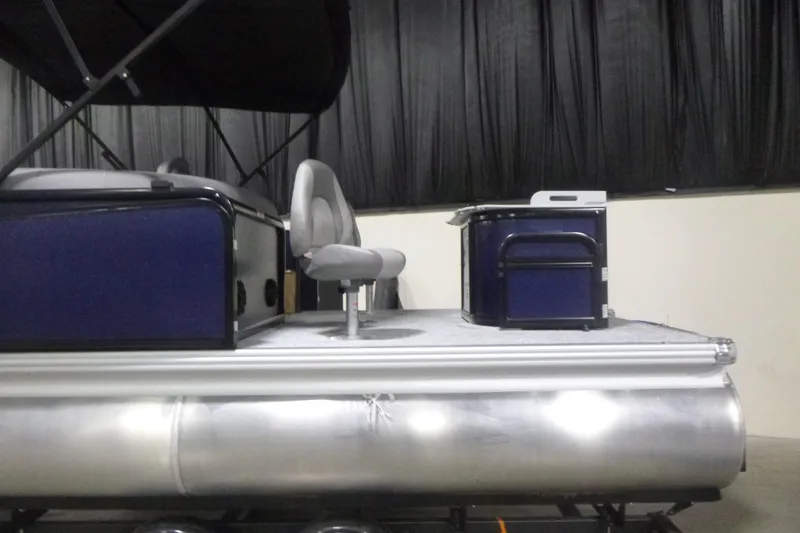 Slide: The Image of 2026 Premier 210 SunSation Angler 4 Point pontoon boat interior with seating and console. - 4