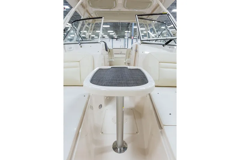 Slide: The Image of Manufacturer Provided Image: 2017 Grady-White Freedom 285 boat interior with seating and table. - 12