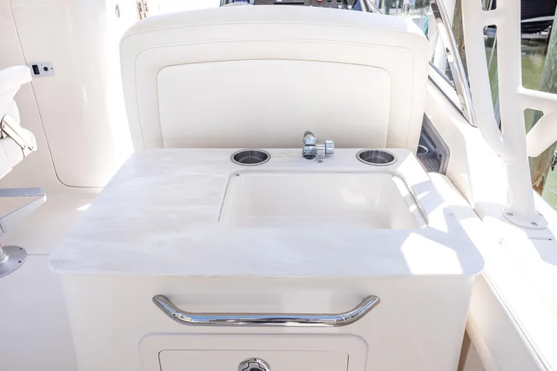 Slide: The Image of 2017 Grady-White Freedom 285 boat sink and countertop detail. - 23