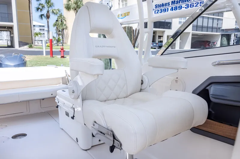 Slide: The Image of 2017 Grady-White Freedom 285 boat seat, luxurious white leather interior. - 34