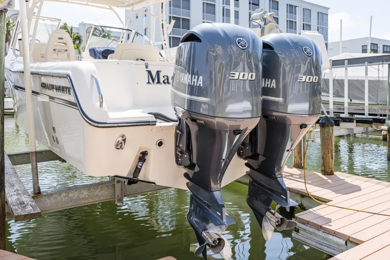 Slide: The Image of 2017 Grady-White Freedom 285 boat with twin Yamaha 300 engines docked in marina. - 6