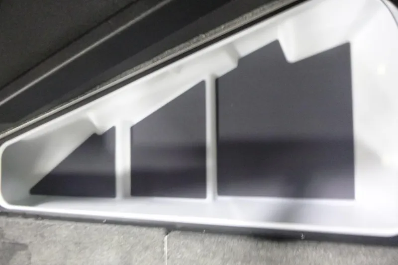 Slide: The Image of Storage compartment in 2026 Alumacraft Trophy 205X Sport boat. - 8