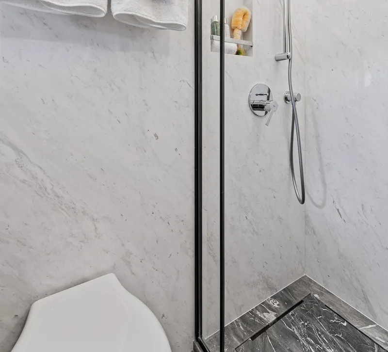 Slide: The Image of Modern bathroom with marble walls and shower in 2025 Aquitalia 78 Fly yacht. - 45