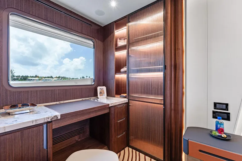 Slide: The Image of Luxurious interior of 2025 Aquitalia 78 Fly yacht with elegant wood finishes and ocean view. - 26