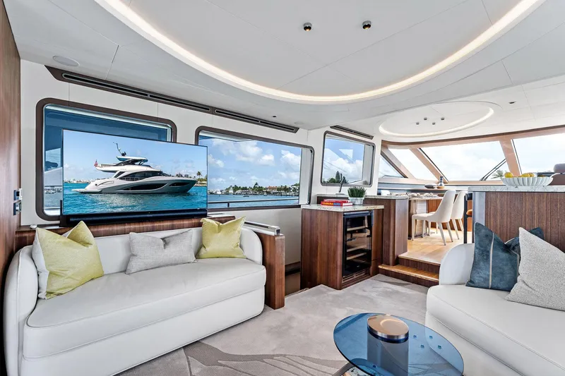 Slide: The Image of Luxurious interior of 2025 Aquitalia 78 Fly yacht with modern furnishings and large windows. - 8