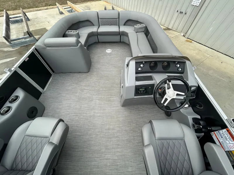 Slide: The Image of Interior of a 2023 Bennington 23 LSB pontoon boat with gray seating. - 3