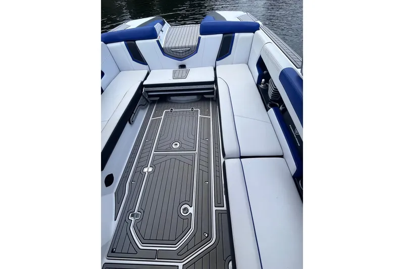 Slide: The Image of 2017 Nautique Super Air Nautique G25 interior with sleek seating and stylish flooring. - 23
