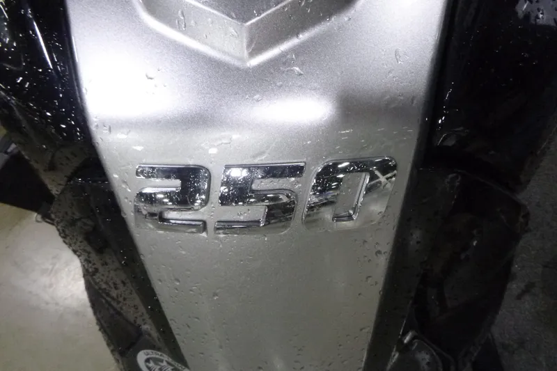 Slide: The Image of Close-up of 250 horsepower engine on 2025 Alumacraft Trophy 205X Sport boat. - 15