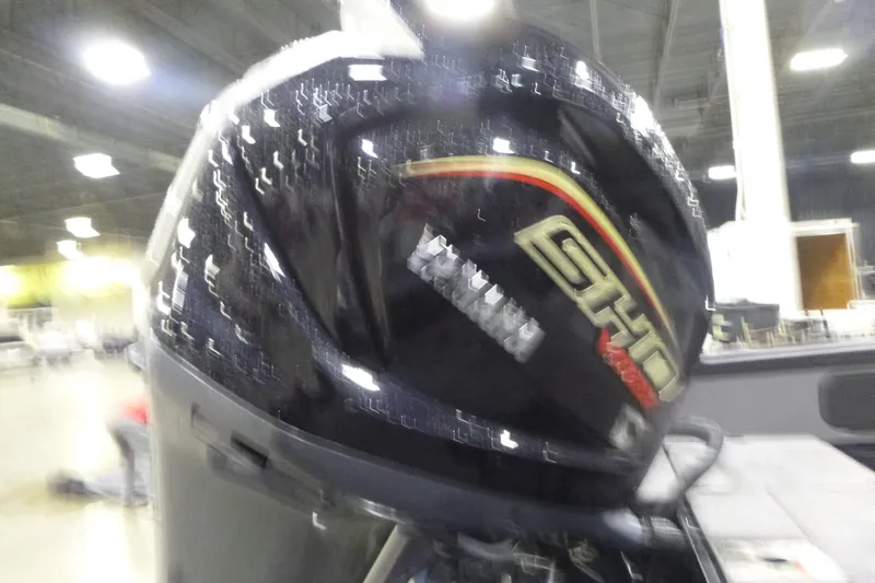 Slide: The Image of 2025 Alumacraft Trophy 205X Sport with Yamaha SHO engine in a showroom. - 16