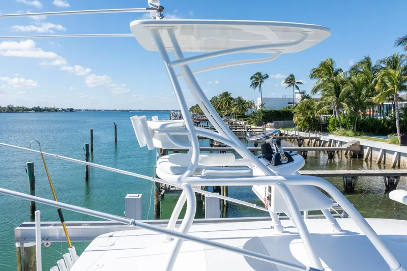 Slide: The Image of 2015 Intrepid 400 Center Console boat with scenic waterfront view. - 11