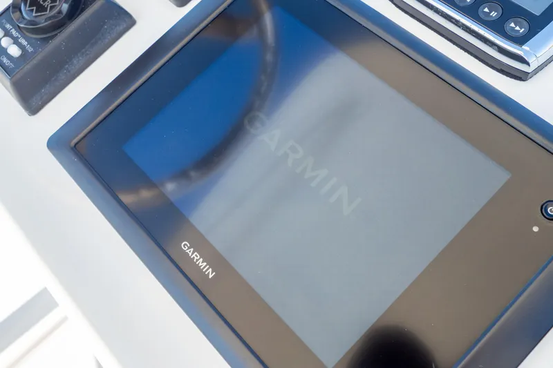 Slide: The Image of Garmin navigation display on 2015 Intrepid 400 Center Console boat dashboard. - 111