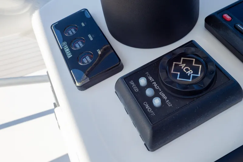 Slide: The Image of Control panel on a 2015 Intrepid 400 Center Console boat. - 113