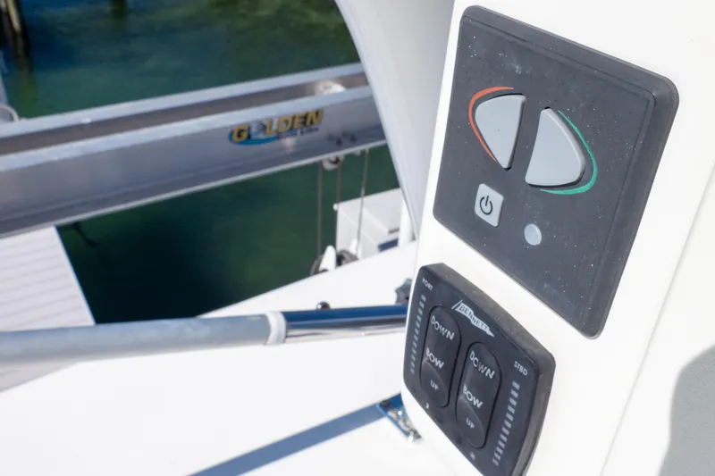 Slide: The Image of Control panel on a 2015 Intrepid 400 Center Console boat. - 115