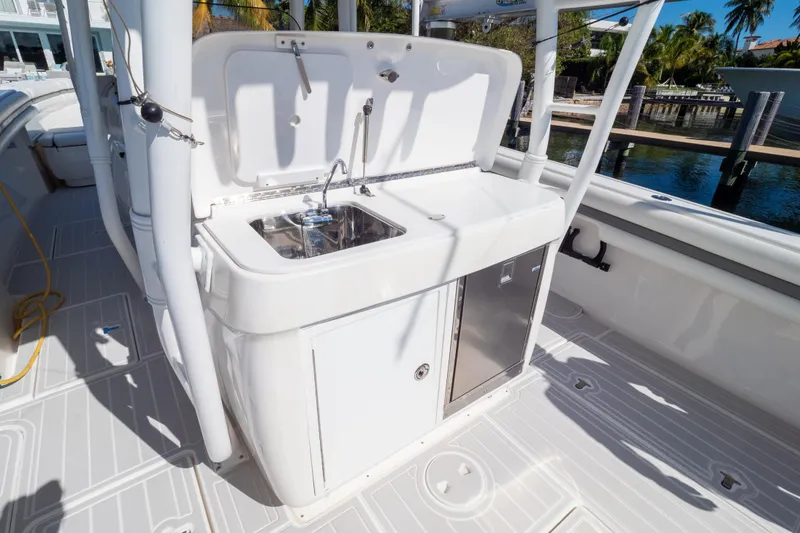 Slide: The Image of 2015 Intrepid 400 Center Console boat with onboard sink and storage. - 49