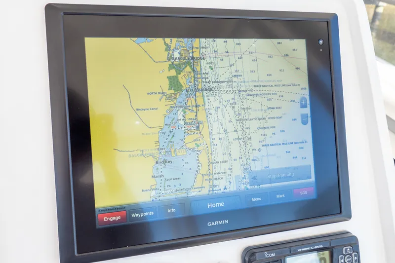 Slide: The Image of Garmin navigation display on 2015 Intrepid 400 Center Console boat, showing detailed marine map. - 70