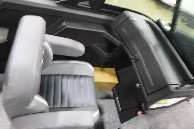 Slide: The Image of 2026 Alumacraft Competitor 205 Sport interior with gray seating and dashboard. - 14
