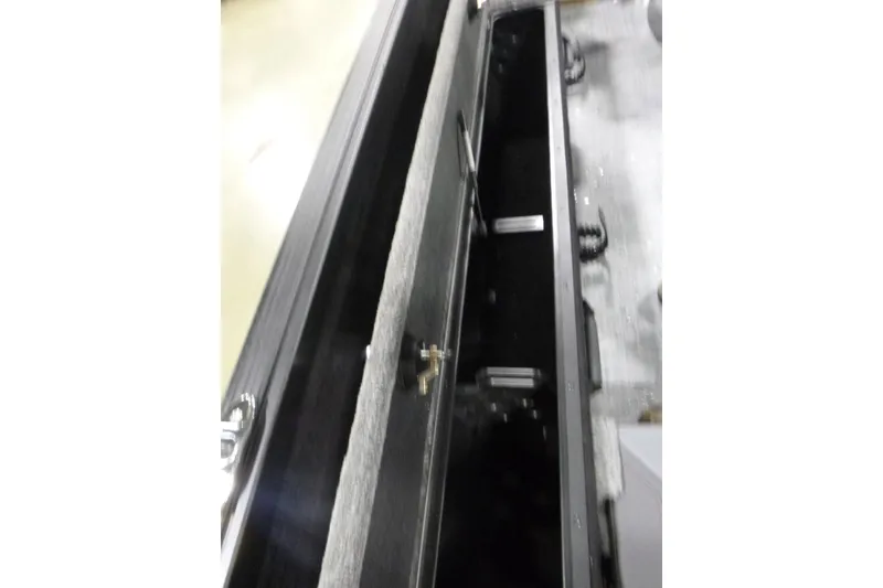 Slide: The Image of 2026 Alumacraft Competitor 205 Sport interior storage compartment, showcasing sleek design and functionality. - 18