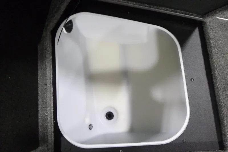 Slide: The Image of Livewell compartment in 2026 Alumacraft Competitor 205 Sport boat, featuring durable construction. - 8