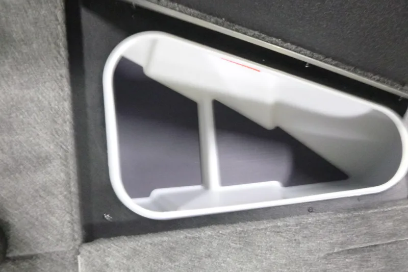Slide: The Image of Storage compartment in 2026 Alumacraft Competitor 205 Sport boat interior. - 9