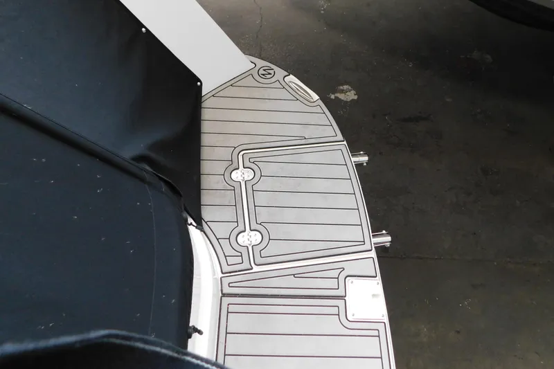 Slide: The Image of 2017 Rinker EX 320 boat deck with custom non-slip surface. - 18
