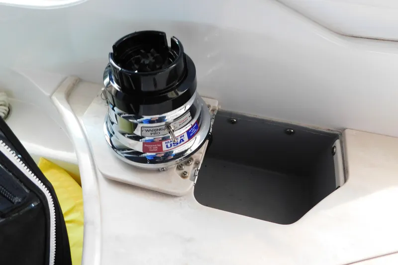 Slide: The Image of 2017 Rinker EX 320 boat with a Waring Pro blender installed. - 44