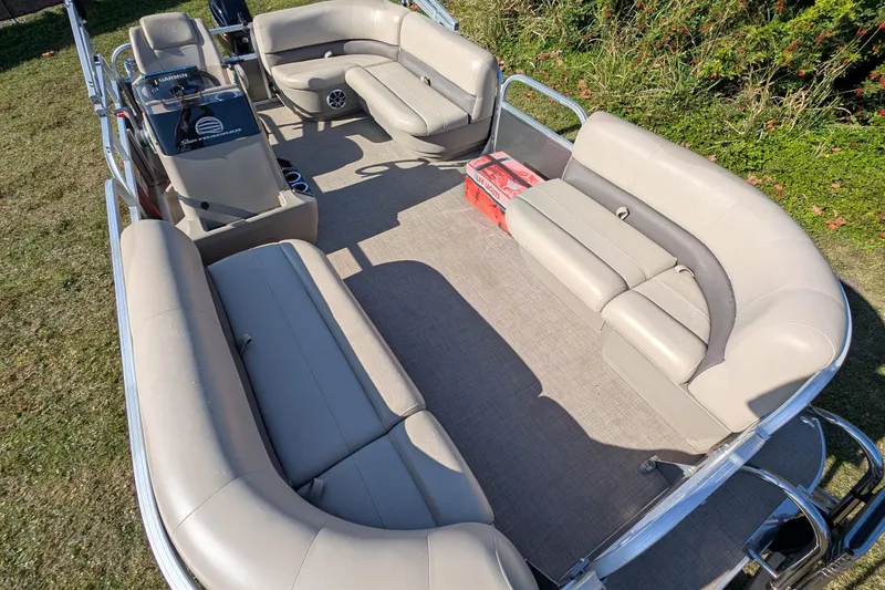 Slide: The Image of 2025 Sun Tracker Party Barge 16 DLX with spacious seating and modern design. - 11