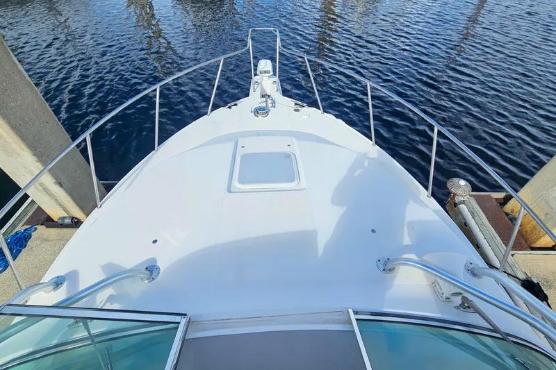 Slide: The Image of 2005 Wellcraft 290 Coastal boat deck view at marina. - 14