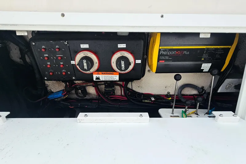 Slide: The Image of Electrical panel and battery charger in 2005 Wellcraft 290 Coastal boat. - 26