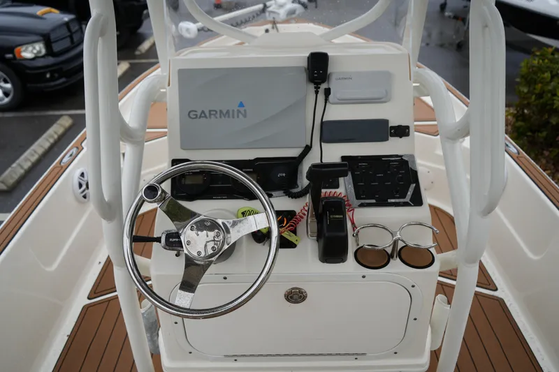 Slide: The Image of 2017 Skeeter SX230 boat console with Garmin navigation and Yamaha controls. - 27