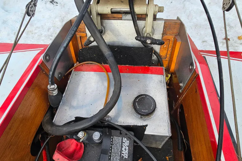 Slide: The Image of 1987 De Silva F Class Race boat interior with mechanical components and wiring. - 12