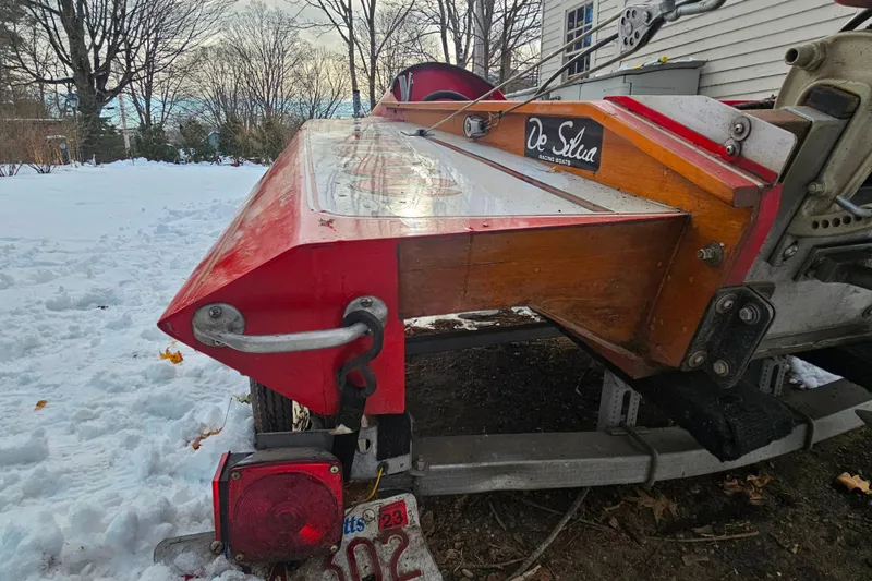 Slide: The Image of 1987 De Silva F Class Race boat on trailer in snowy yard. - 16