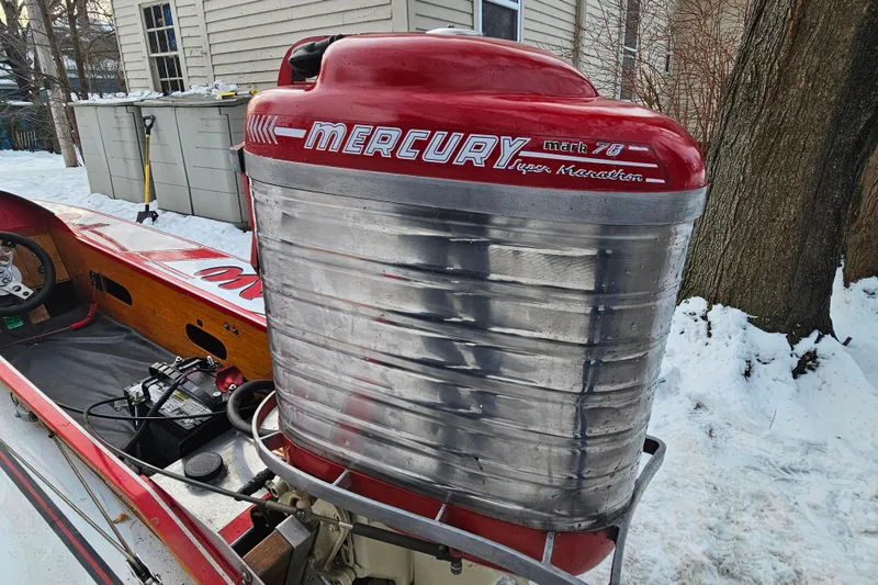 Slide: The Image of 1987 De Silva F Class Race boat with Mercury Mark 78 engine in snowy setting. - 18