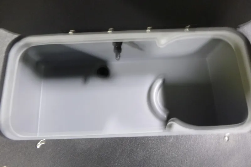 Slide: The Image of Livewell compartment in 2026 Sun Tracker Fishin' Barge 22 DLX boat. - 17