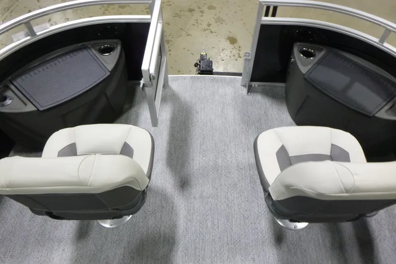 Slide: The Image of Interior of 2026 Sun Tracker Fishin' Barge 22 DLX with two swivel seats. - 6