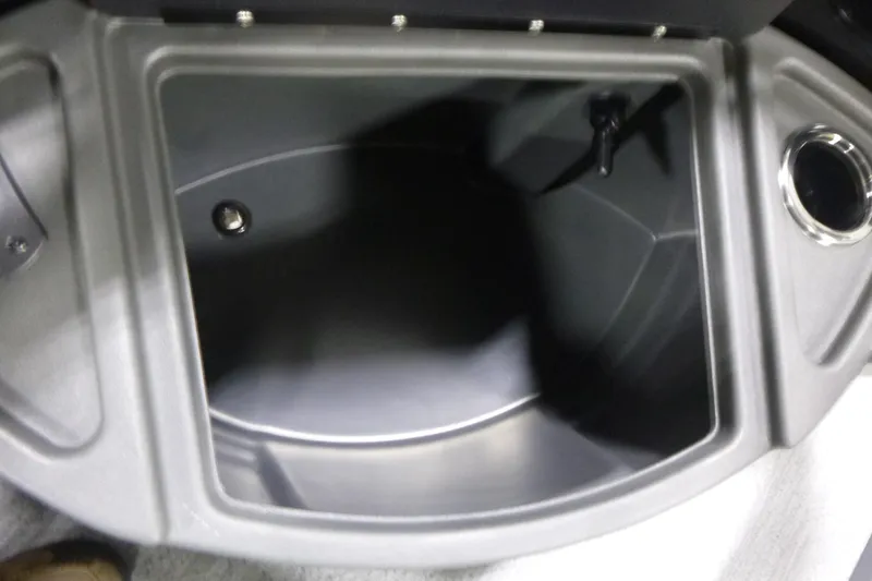 Slide: The Image of Storage compartment of 2026 Sun Tracker Fishin' Barge 22 DLX boat. - 7